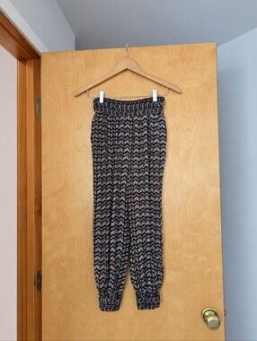 Anthropologie Chevron-Print Joggers in Black, Orange And Tan
